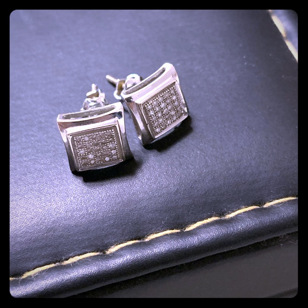 Diamond earrings set in sterling silver